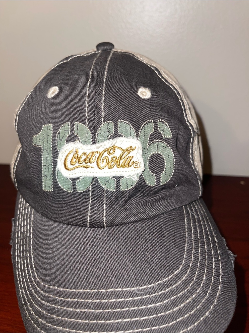 Coca-Cola Black Cap with Mint Green 1896 and Gold Logo Patch